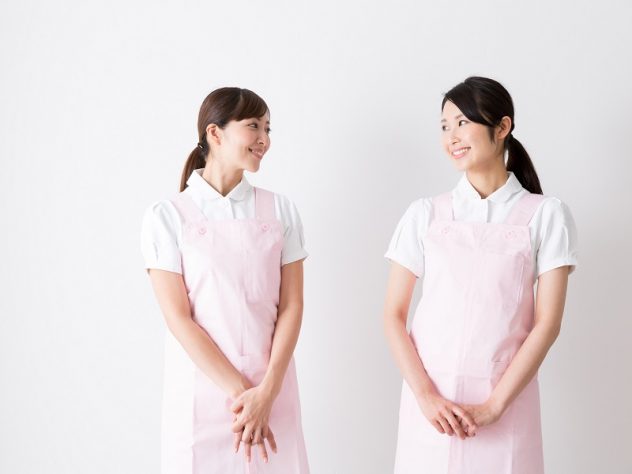 young asian nurse isolated on white background